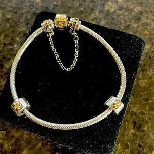 Two toned Pandora bracelet with clips and safety chain